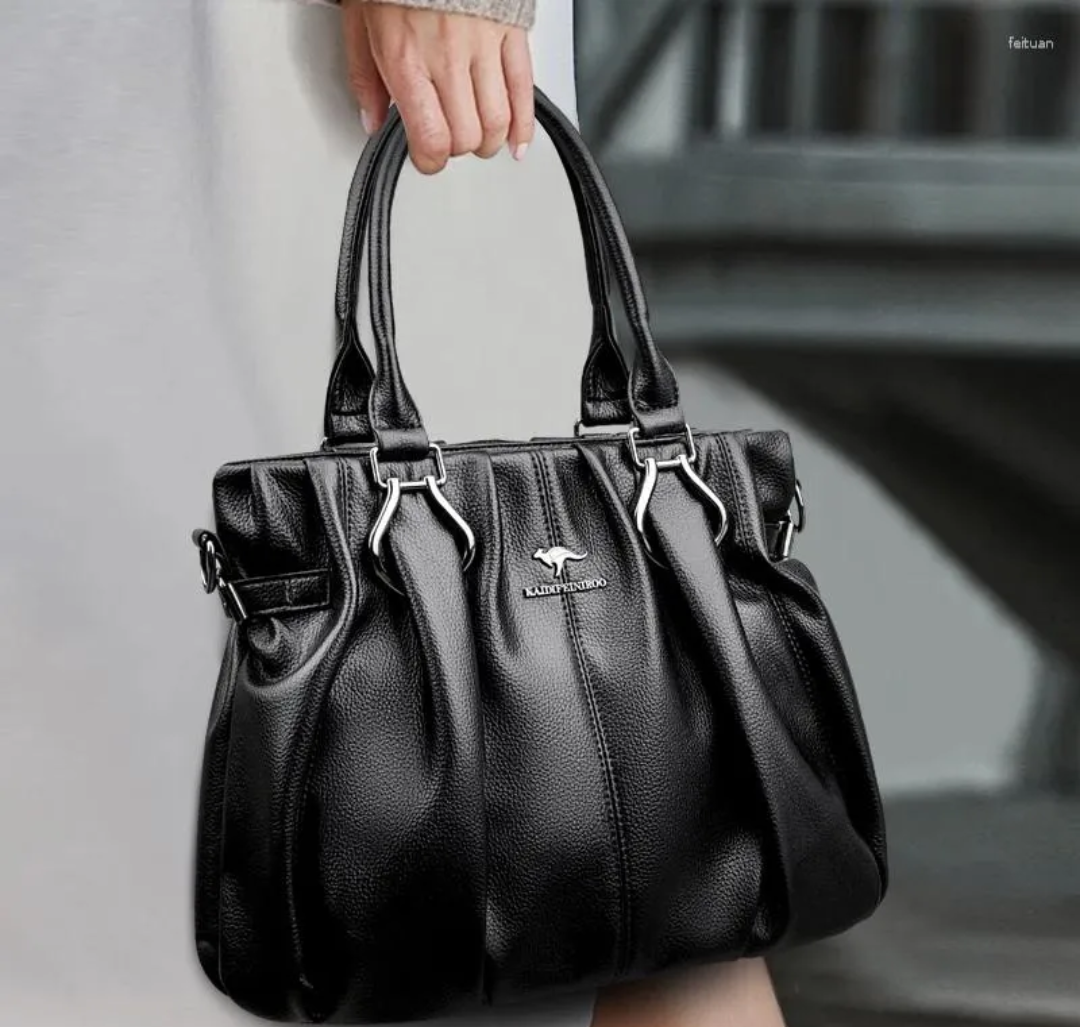 Eden-Kurve Schultertasche